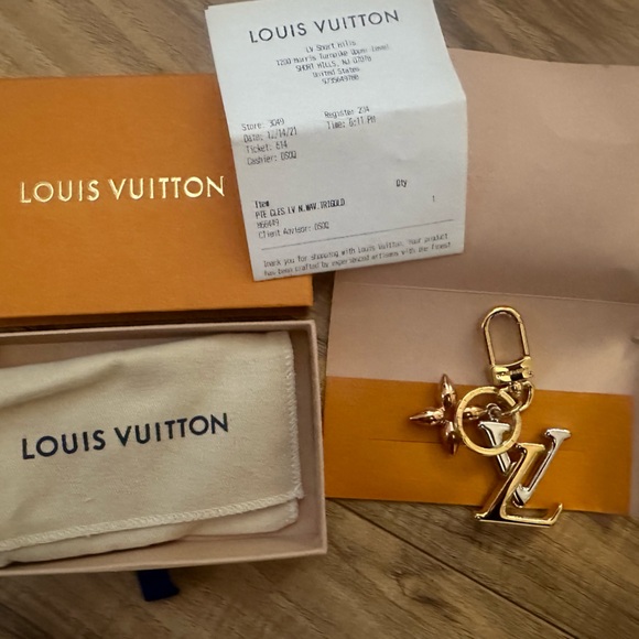 Louis Vuitton key chain/ bag charm brand new never used with receipt! - Picture 5 of 5